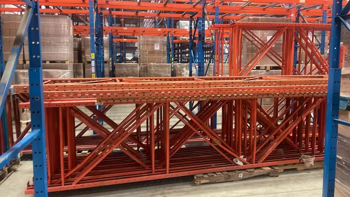 Orange frames banded in a seller's warehouse