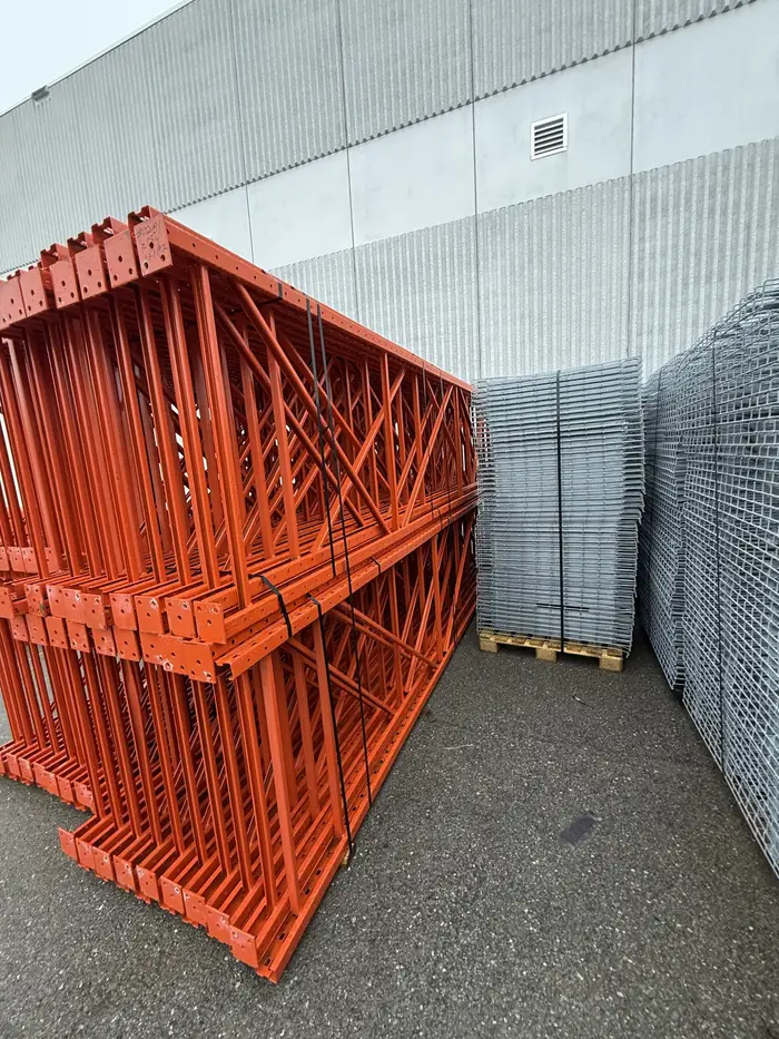Orange frames and stacked wire decks in our yard
