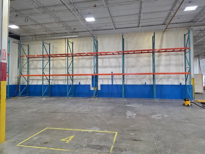 A finished run of racking along a curtain wall