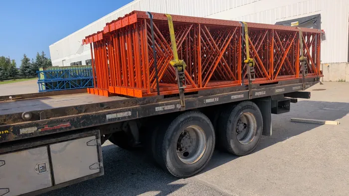 Upright frames strapped on a flatbed truck