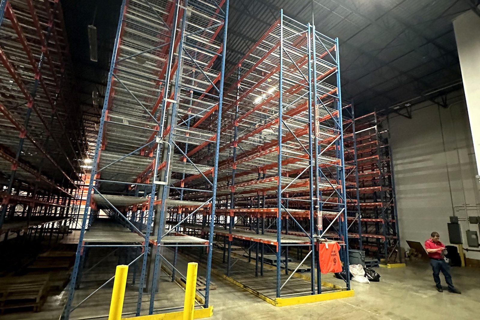 416 Industrial installation crew — selective racking aisle, GTA