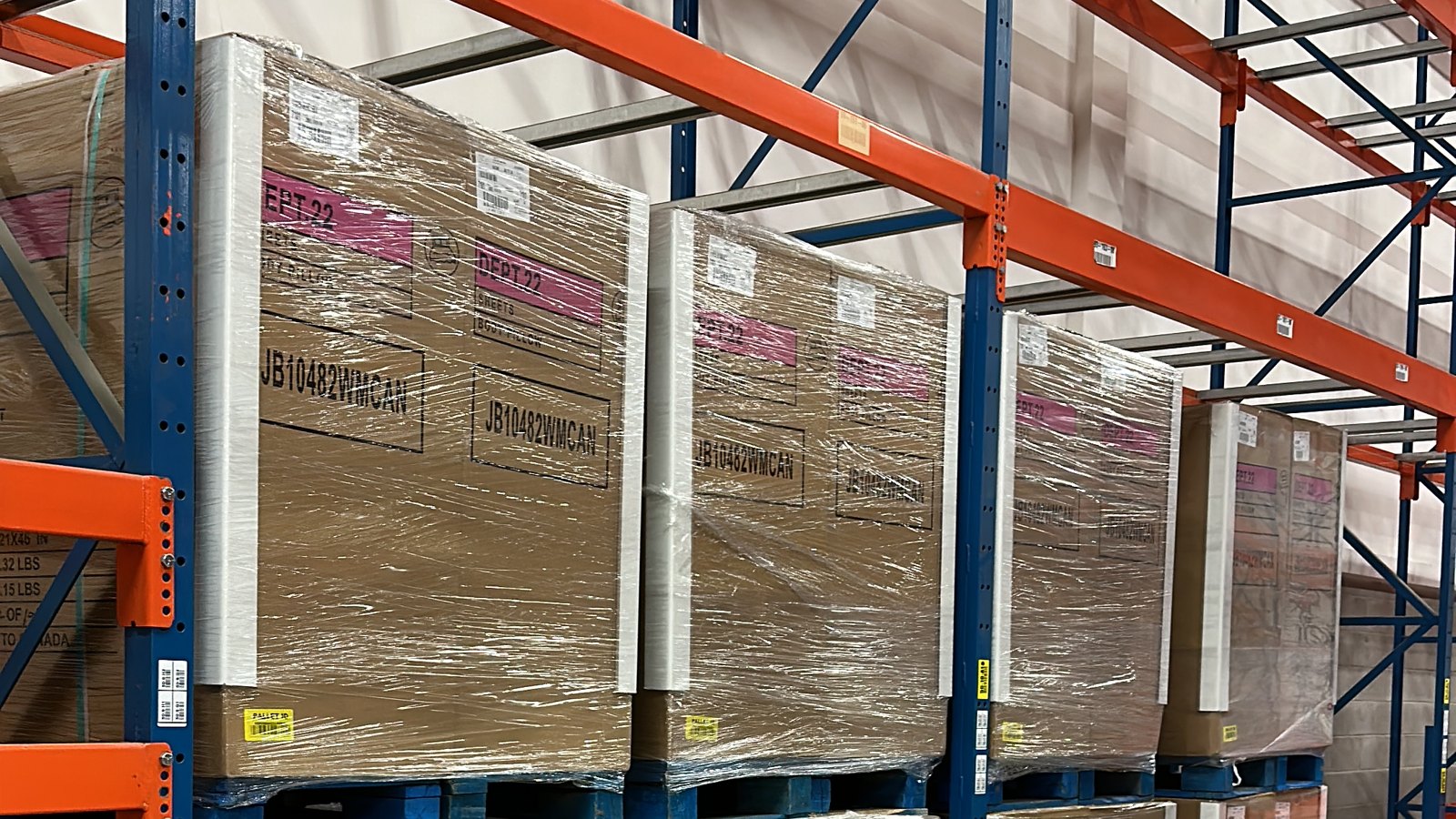 Packed e-commerce cartons on pallet racking — real 416 install in the GTA
