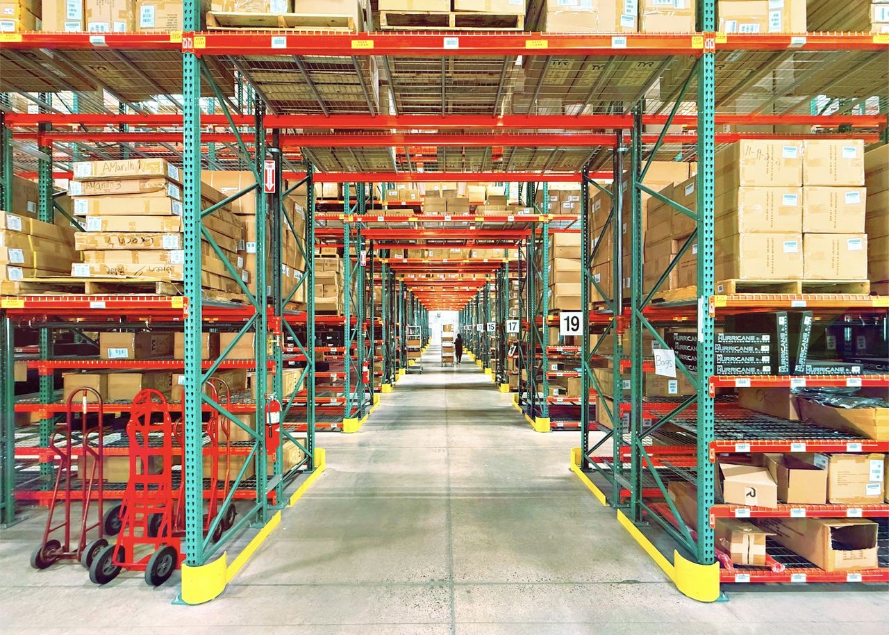 Steel upright rack frame on a warehouse floor